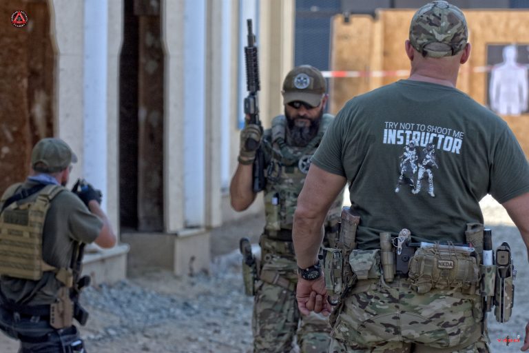 Romulus Mihu teaching tactical training techniques.